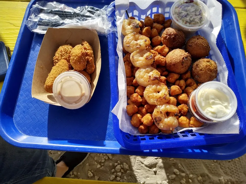 Scallops Shrimp Jalapeño Poppers and Hush Puppies